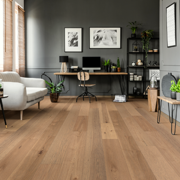 warm toned wood flooring in home office with plants